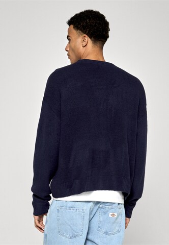 Vestes en maille Karl Kani en bleu