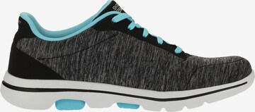 SKECHERS Sneaker in Grau