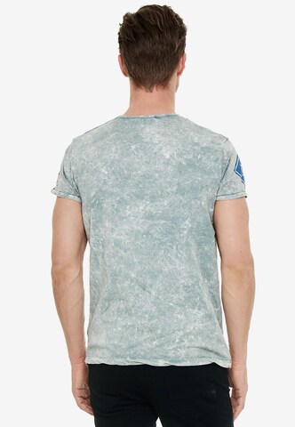 Rusty Neal T-Shirt mit großem Frontprint in Grau