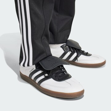 ADIDAS ORIGINALS Slim fit Sports trousers 'Colo-Colo Anniversary' in Black