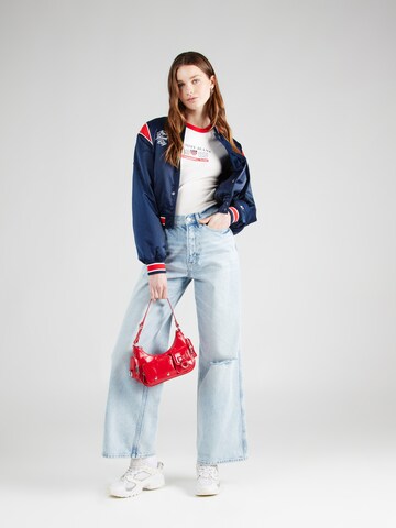 Tommy Jeans Zvonové kalhoty Džíny 'CLAIRE WIDE LEG' – modrá