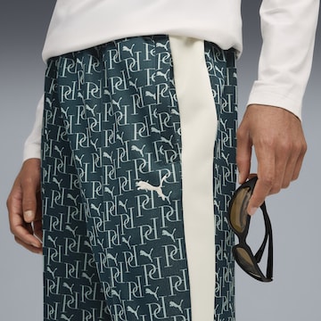 PUMA Loosefit Sportbroek 'T7' in Groen