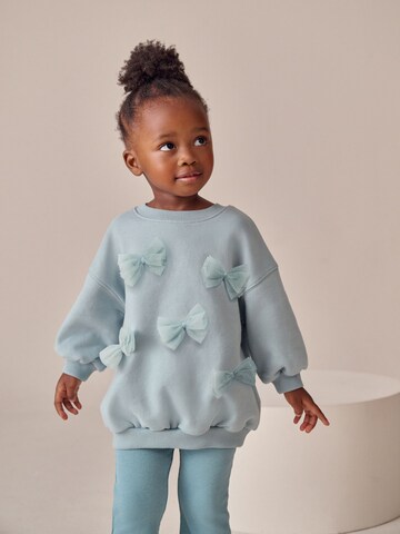 Set Next en bleu