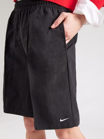 Nike Sportswear - regular Pantalón plisado 'EVRYTHNG' en negro