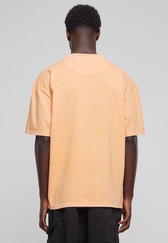 oranžs Karl Kani T-Krekls 'Small Signature'