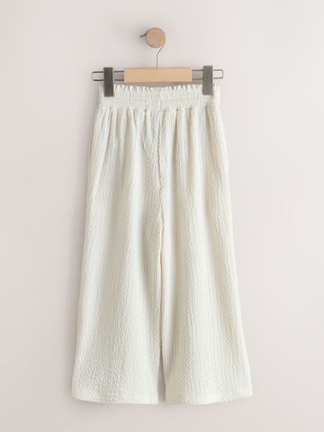 Next Wide Leg Housut värissä beige