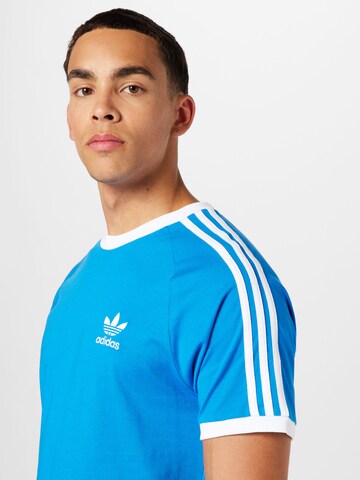 ADIDAS ORIGINALS Bluser & t-shirts 'Adicolor Classics' i blå