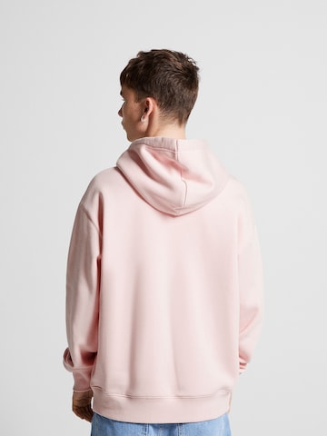 Sweat-shirt Bershka en rose