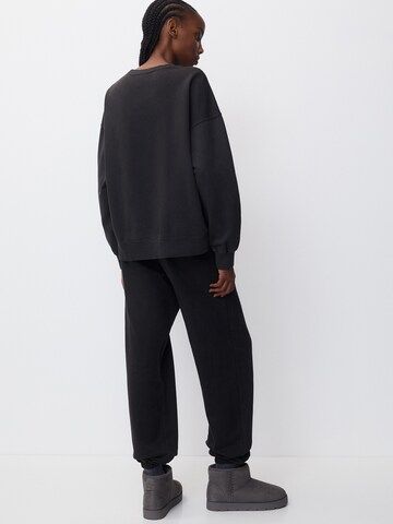 Pull&Bear Zwężany krój Spodnie w kolorze czarny