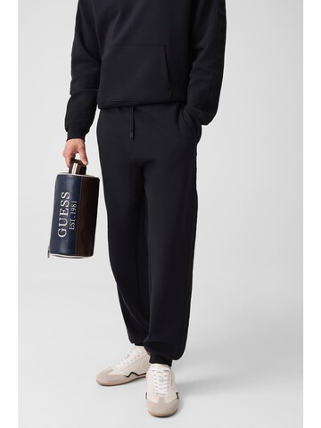 GUESS Tapered Pants in Black: front