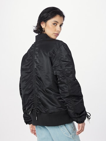 Veste mi-saison ALPHA INDUSTRIES en noir