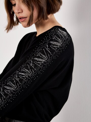 Pull-over ' ' Apricot en noir
