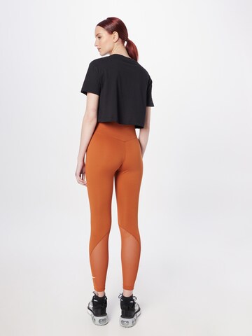 NIKE Skinny Sporthose 'One' in Orange