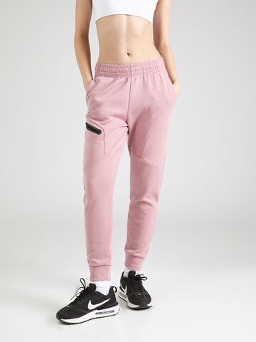 UNDER ARMOUR Tapered Workout Pants 'Unstoppable' in Pink: front