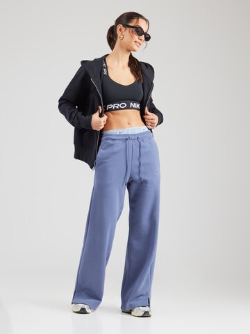 Nike Sportswear Zvonové kalhoty Kalhoty 'PHNX FLC' – modrá