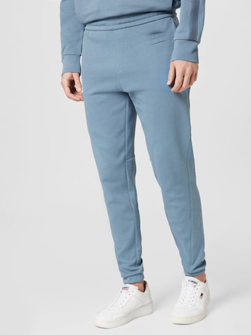 Calvin Klein Zúžený Kalhoty – modrá: přední strana
