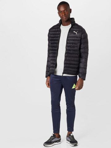 PUMA Sportsjakke i sort