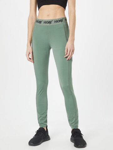 Skinny Pantaloni sportivi di HKMX in verde: frontale