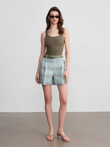 Dilvin Wide leg Trousers in Green: front