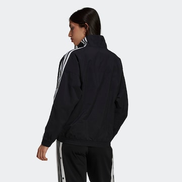 ADIDAS ORIGINALS Between-Season Jacket 'Adicolor Classics Lock-Up' in Black