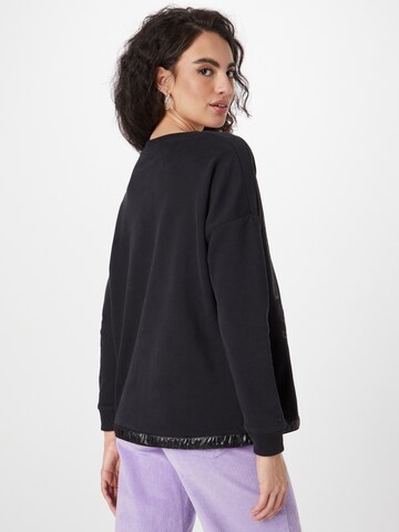 Sweat-shirt Soccx en noir