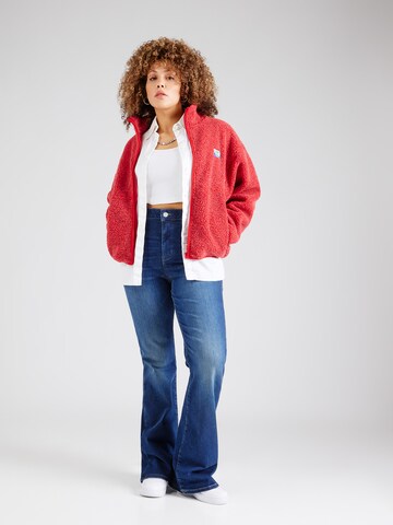 Tommy Jeans Curve - Flared Calças de ganga 'Sylvia' em azul