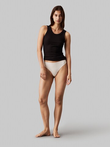 Calvin Klein Underwear Tanga – béžová