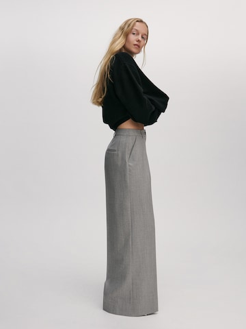 ABOUT YOU x Marie von Behrens Wide leg Trousers 'Line' in Grey