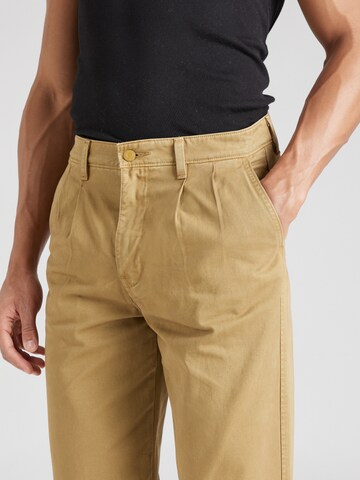 ruda LEVI'S ® Laisvas Klostuotos kelnės