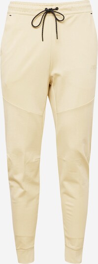 Nike Sportswear Pantalon en jaune pastel, Vue avec produit
