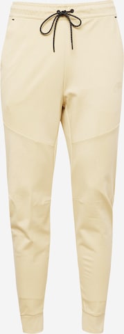 Effilé Pantalon Nike Sportswear en jaune : devant