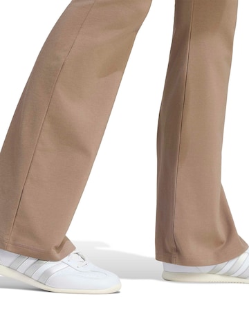 ADIDAS SPORTSWEAR Flared Sports trousers 'Essentials' in Green