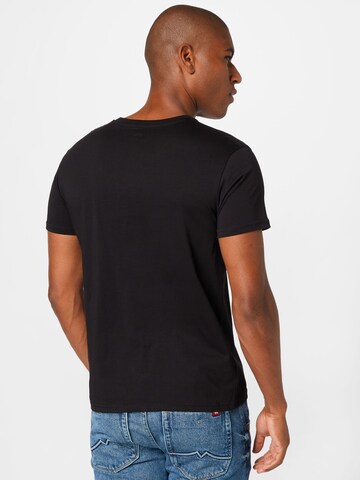 Coupe regular T-Shirt ALPHA INDUSTRIES en noir