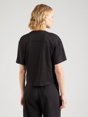 PUMA Funktionstopp 'Cloudspun' i svart
