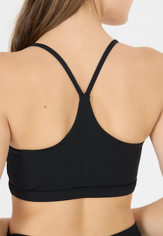 Athlecia Low Support Sport-BH 'Blossom' in Braun