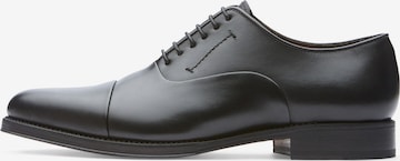 LOTTUSSE Lace-Up Shoes in Black: front