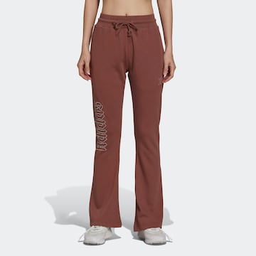 ADIDAS ORIGINALS Flared Pants in Brown: front