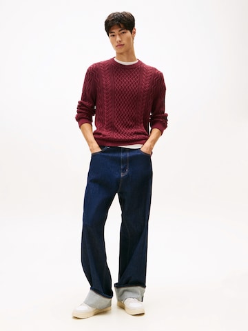 Pull-over Tommy Jeans en rouge