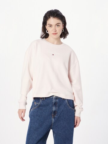 Bluză de molton de la Tommy Jeans pe roz: față