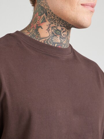 MELA T-shirt 'BHAJAN' i brun