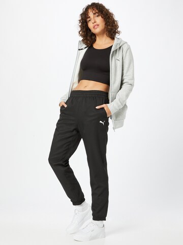 PUMA Tapered Sports trousers in Black