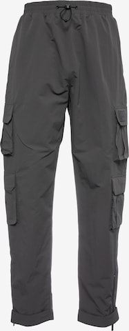 Karl Kani Tapered Cargo Pants in Grey: front