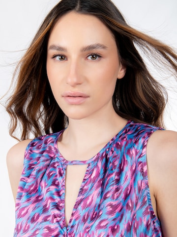 Influencer - Top en Mezcla de colores