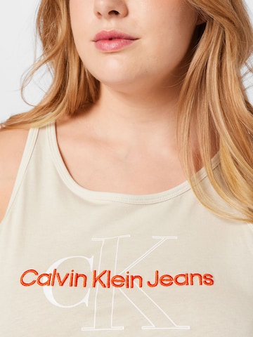 Calvin Klein Jeans Curve قطعة علوية بلون بيج