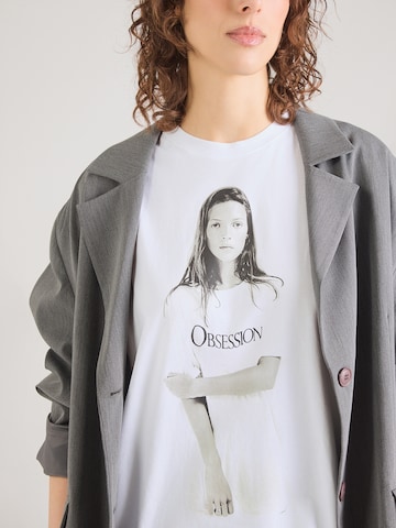 Maglietta 'OBSESSION' di Calvin Klein in bianco