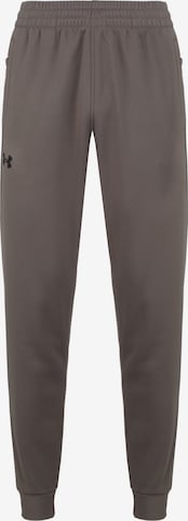 UNDER ARMOUR Sports trousers in Brown: front