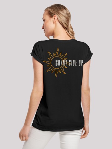 T-shirt 'Sunny side up' F4NT4STIC en noir : devant