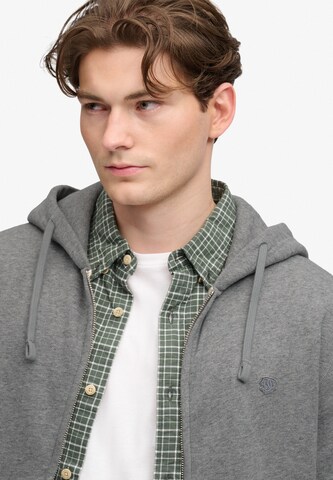 Veste de survêtement 'ESSENTIAL' Superdry & Co en gris