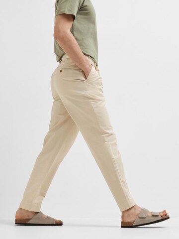 SELECTED HOMME Loose fit Pleat-front trousers 'ADAM' in Beige