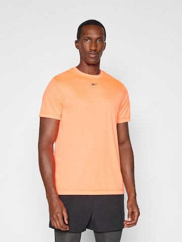 Reebok Funkční tričko 'ID TRAIN' – oranžová: přední strana
